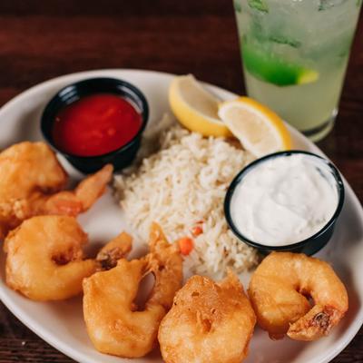 Battered Shrimp, served with rice, and sauces.