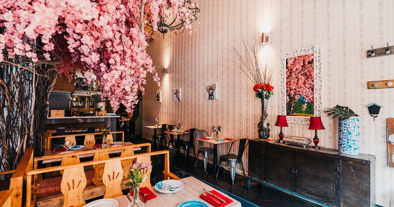 Nice decorated dining area with set tables