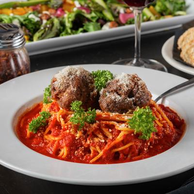 Spaghetti with meatballs and tomato sauce.