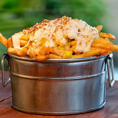 Fries with corn, garlic aioli, cotija cheese, and cayenne peppers.