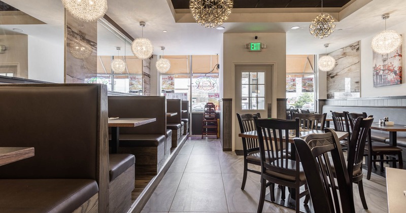 Interior, tables and chairs, booths on the left