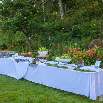 Food displayed outside for a celebration