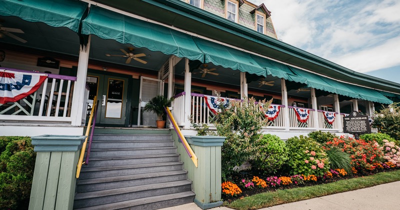 Exterior, entrance with driveway, staircase, terrace and garden in front