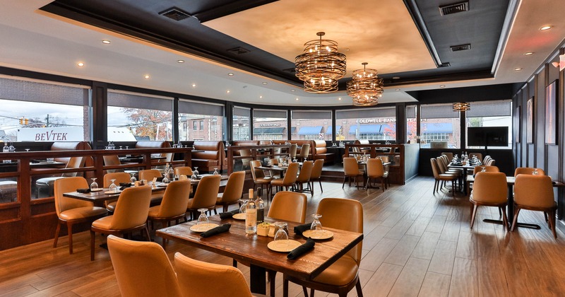 Interior, spacious dining area with tables and chairs