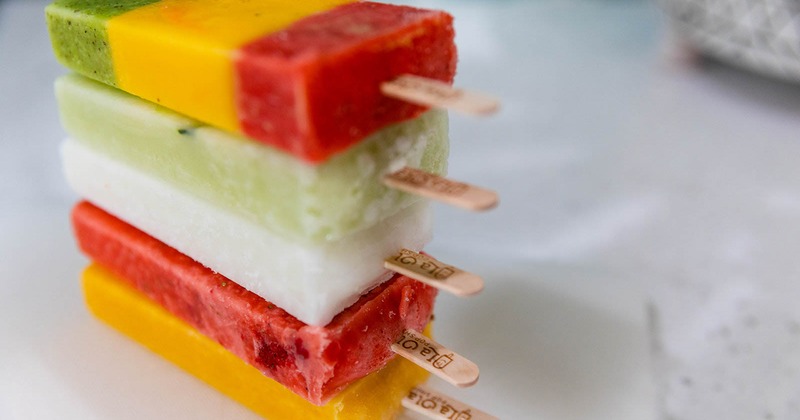 Assorted ice pops stacked one upon each other