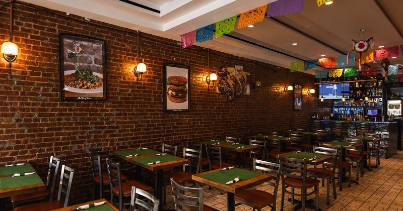 Interior dining area with set tables ready for guests