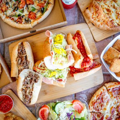 Assorted dishes spread on a table.