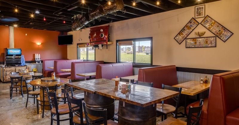 Inside, leather booths, tables, chairs, decoration