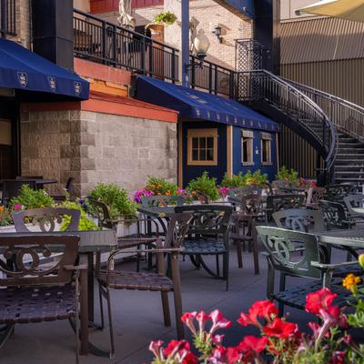 Exterior, seating area, tables and chairs.