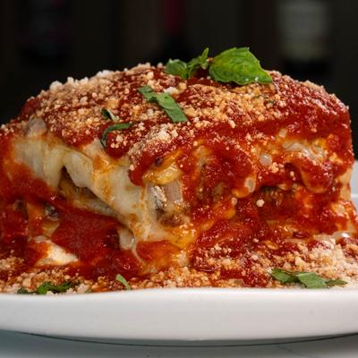 Lasagna served, close-up.