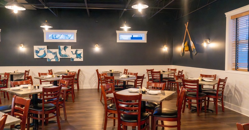 Interior, tables and chairs ready for guests