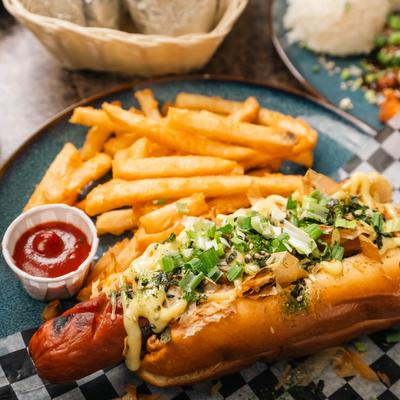 Japadog with fries  and ketchup.