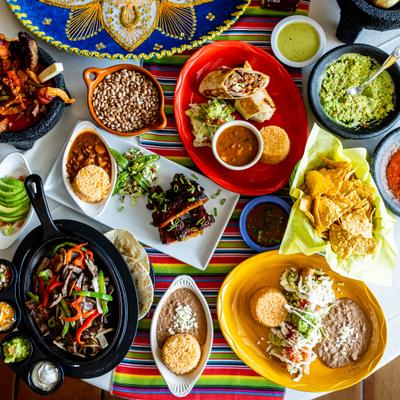 Various dishes served on a table, top view.