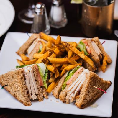 Turkey club served with fries