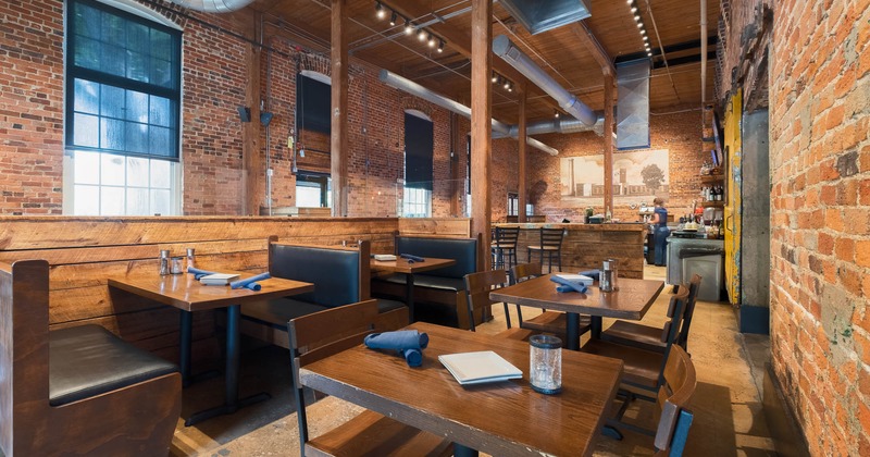 Dining area with booths, tables and chairs