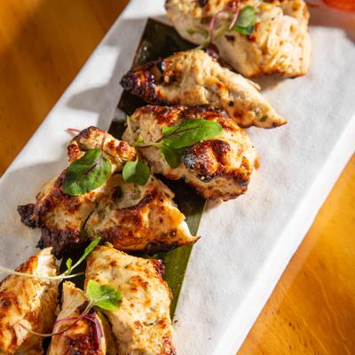 Chicken kebab, with cream, nutmeg, cashew, and mixed green.