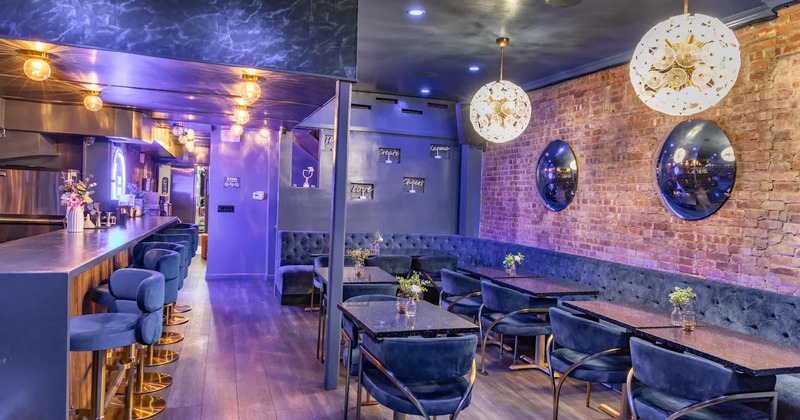 Modern style of interior design with a bar on the left side and a seating area on the right