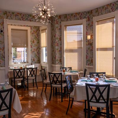 Restaurant interior, dining tables ready for guests