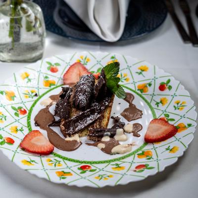 Double Chocolate Pralines on a patterned plate.