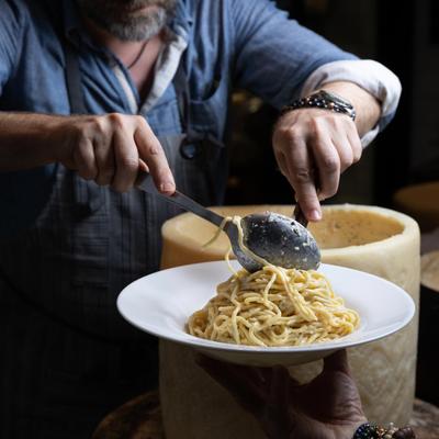 Employee serving spaghetti