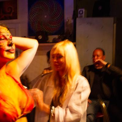 A person being masked for a themed event.