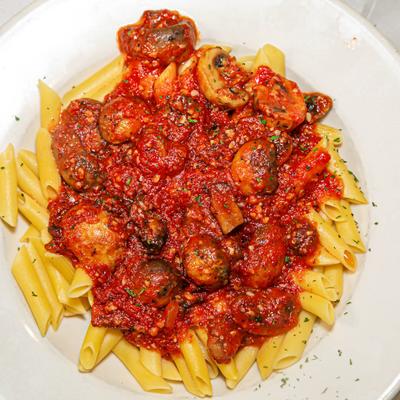 Mushroom pasta, with marinara sauce.