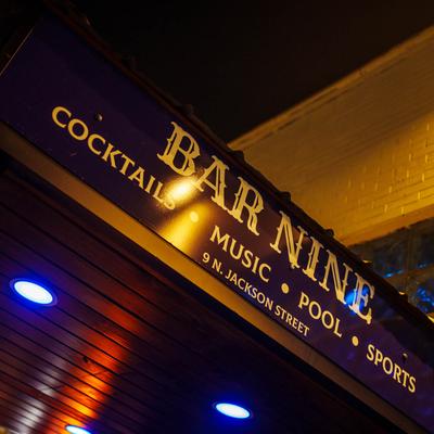 The bar's name on a board.