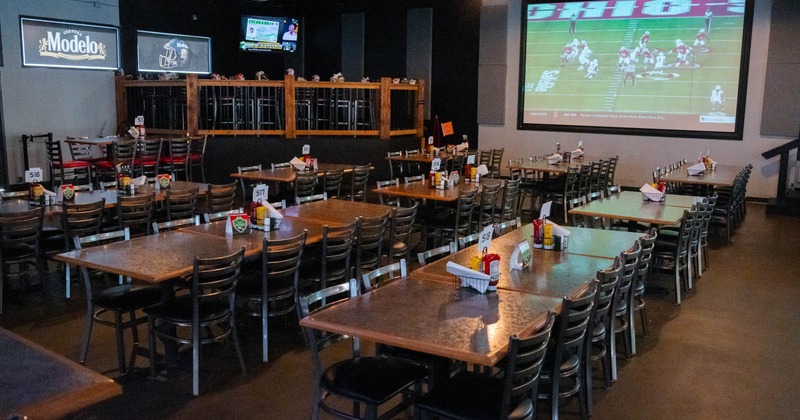 Interior, dining tables placed in rows