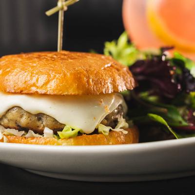 Chicken and Mushroom Burger, with lettuce, closeup.