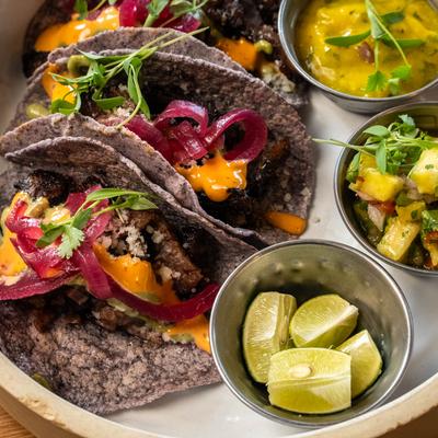 Short rib tacos, with pickled onions, carrots, and mango habanero salsa.