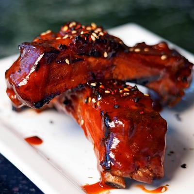 Served ribs in the plate.