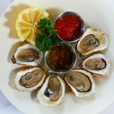 Fresh Oysters, with cocktail sauce.