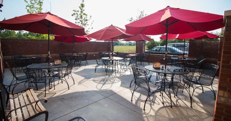 Exterior patio, tables ready for guests