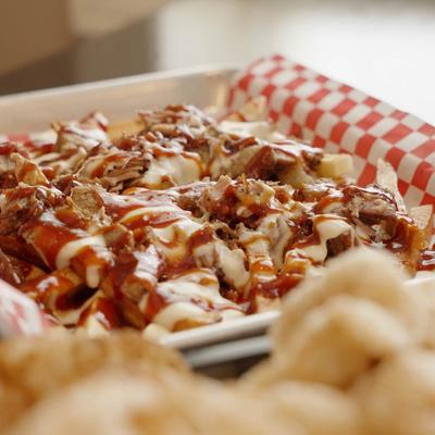 Loaded fries, with BBQ sauce, and brisket.