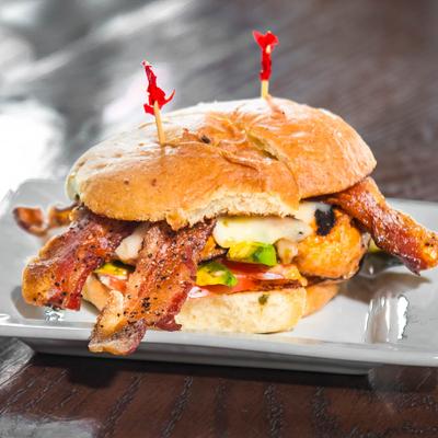 Grilled chicken sandwich, with jalapenos, pepper jack cheese, avocado, tomato, and spicy mayo.