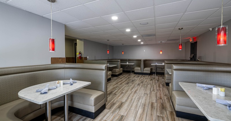 Interior, ''Hangover room'' dining area, seating booths with tables with marble top tables