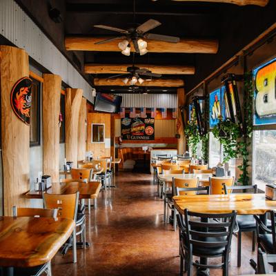 High-top tables inside a restaurant dining area