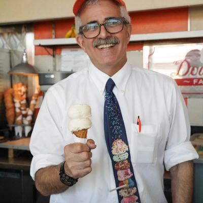 Thad Doumar holding an ice cream cone.