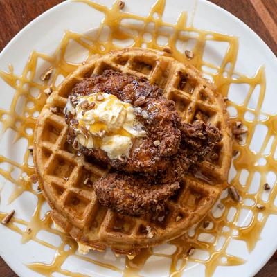 Southern Fried Chicken & Waffle plate on a table, top down view.