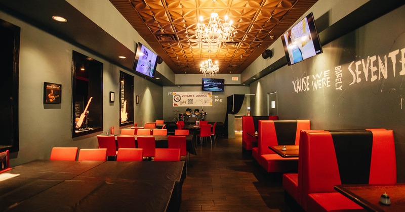 Interior, tables, chairs and restaurant booths in dining area
