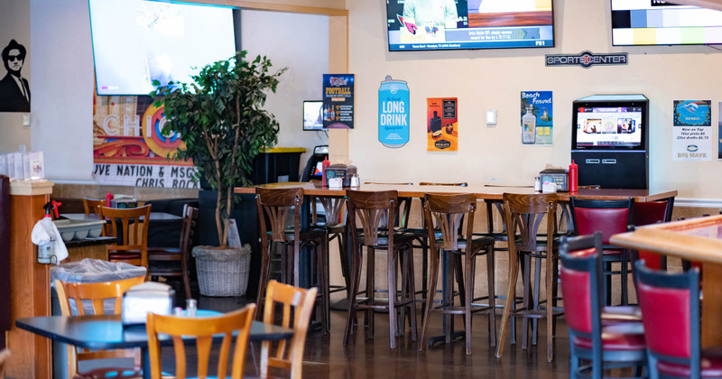 Interior, tall tables ready for guests