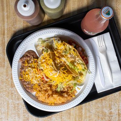 Tacos, rice, beans, and salsa.