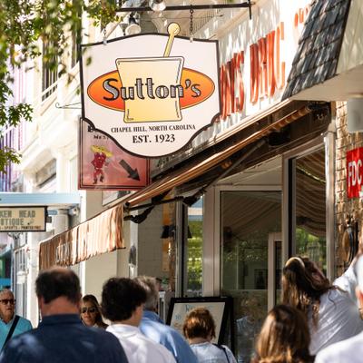 View at the restaurant's entrance with a sign.