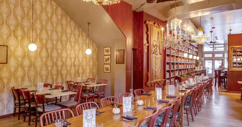 Interior, long dining table, bookshelf