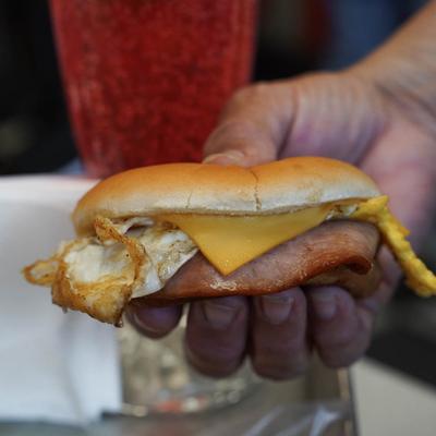 Egg-O-Doumar egg cheese and ham on a roll.