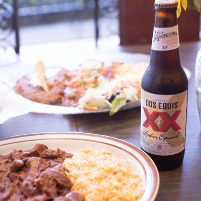 Dishes and Dos Equis Beer