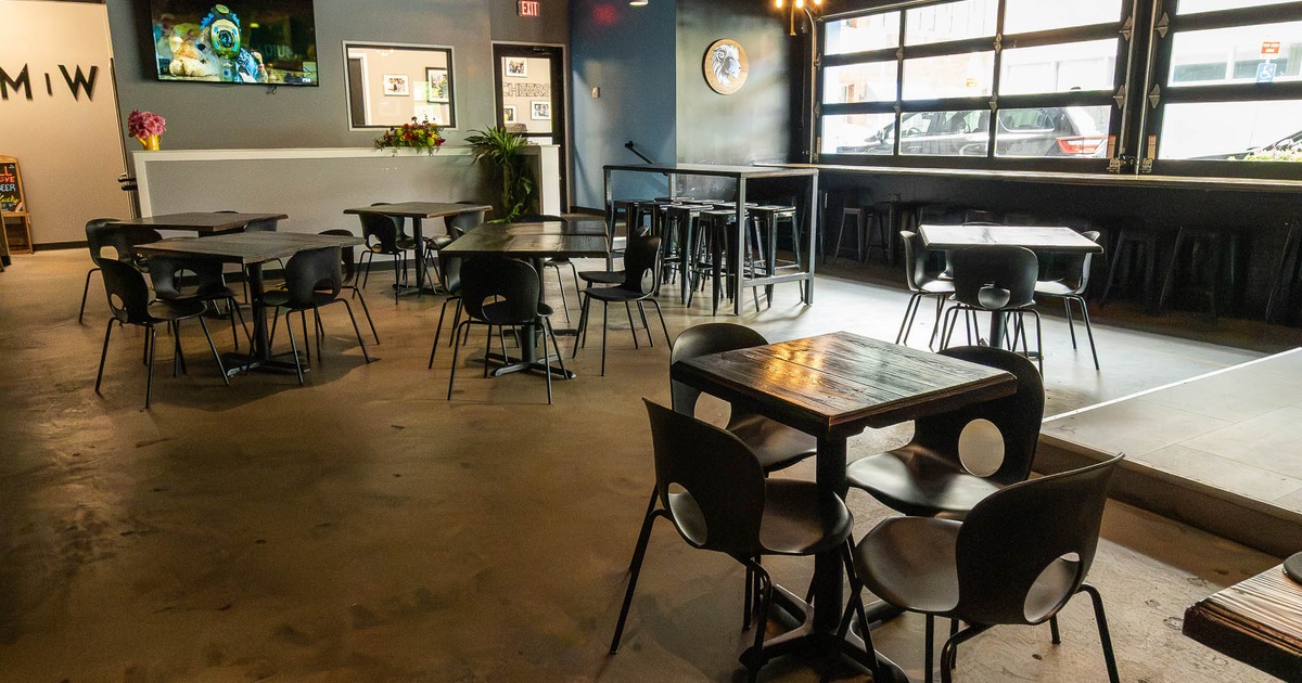 Interior, tables and chairs in seating area