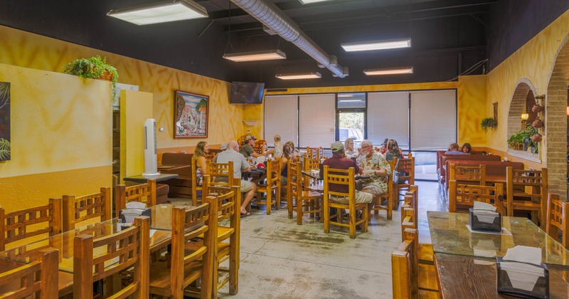 Interior, people dining in dining area