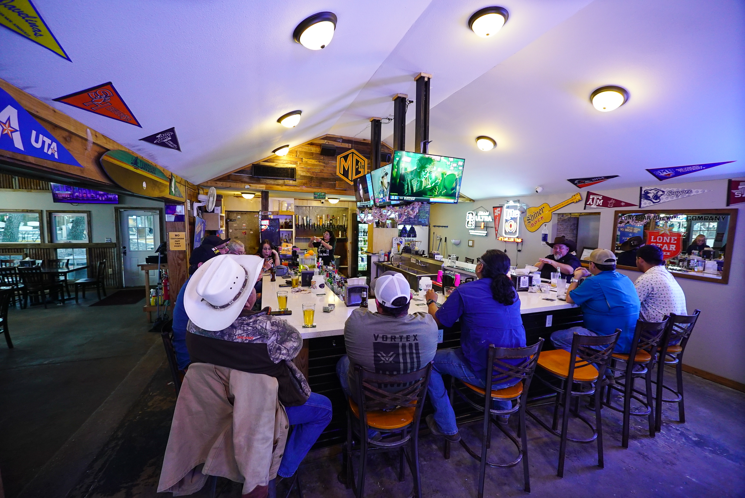 Customers sitting at the bar