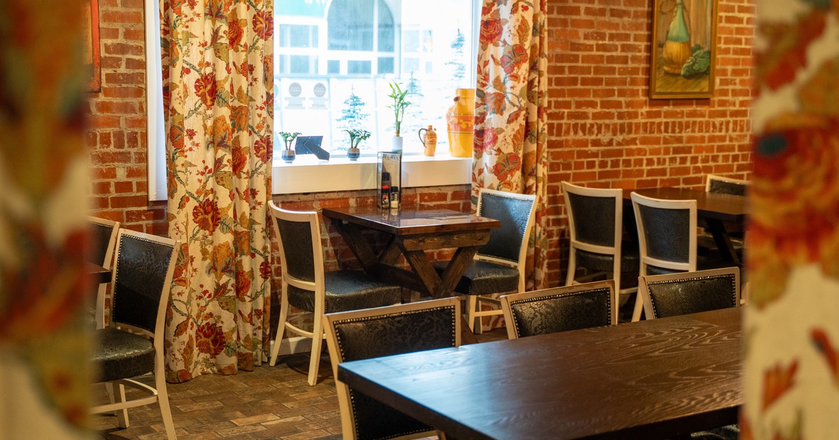 Interior, seating area with red brick walls